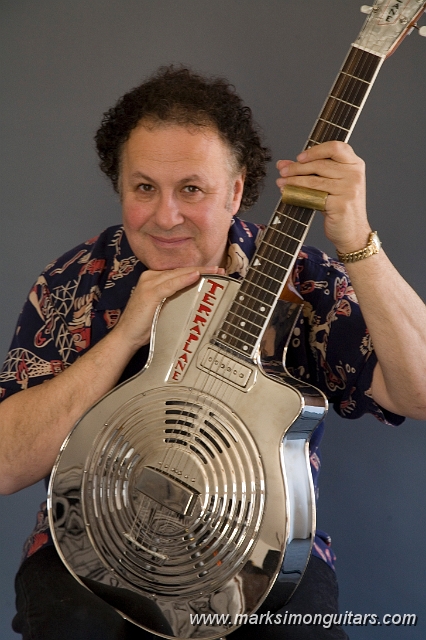 ArlenTP.jpg - Arlen Roth with a nickel-plated Terraplane™ Resonator.-Visit www.terraplaneguitars.com for more.